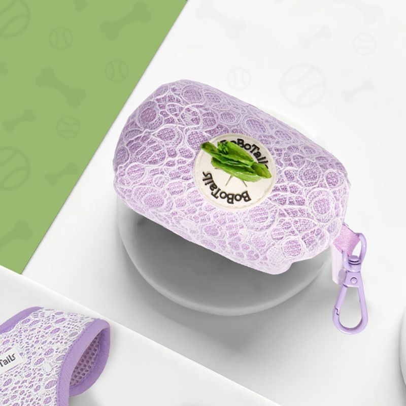Purple lace-patterned pet nail clipper case with a visible brand logo on a white background.