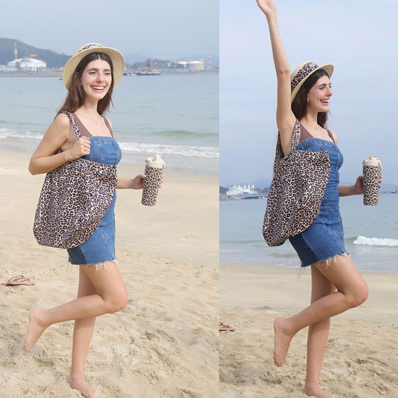 Premium leopard tote bag designed for dog moms who love matching lifestyle accessories with their pups.