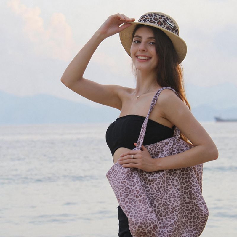 Classic leopard tote bag designed to complement matching dog and owner lifestyle collections.