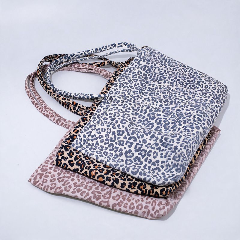 Bobotails leopard tote bag for dog lovers featuring a stylish designer print for everyday outings and beach adventures.