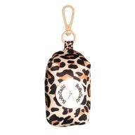 leopard printed dog poop bag holder matching the leopard harness and owner accessories for daily dog walks
