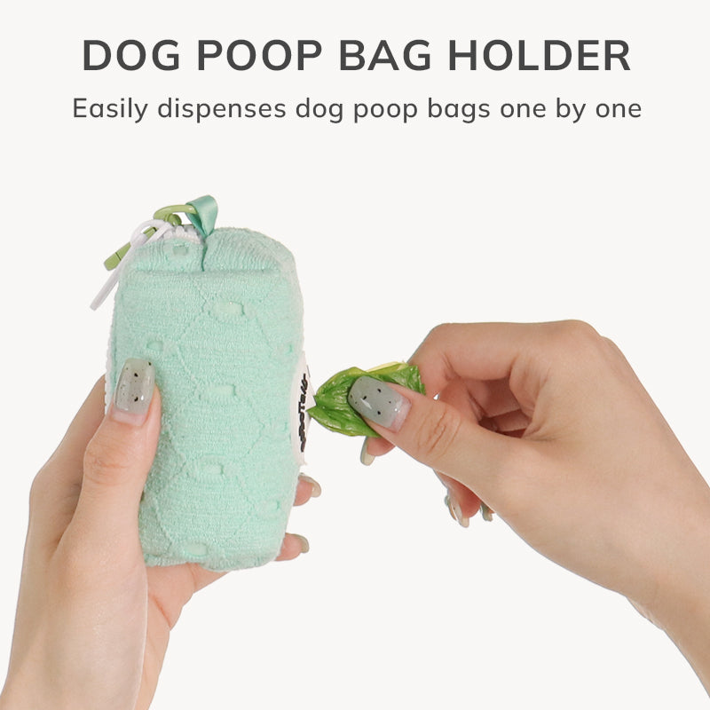 Dog poop bag holder being used with text indicating it easily dispenses dog poop bags one by one.