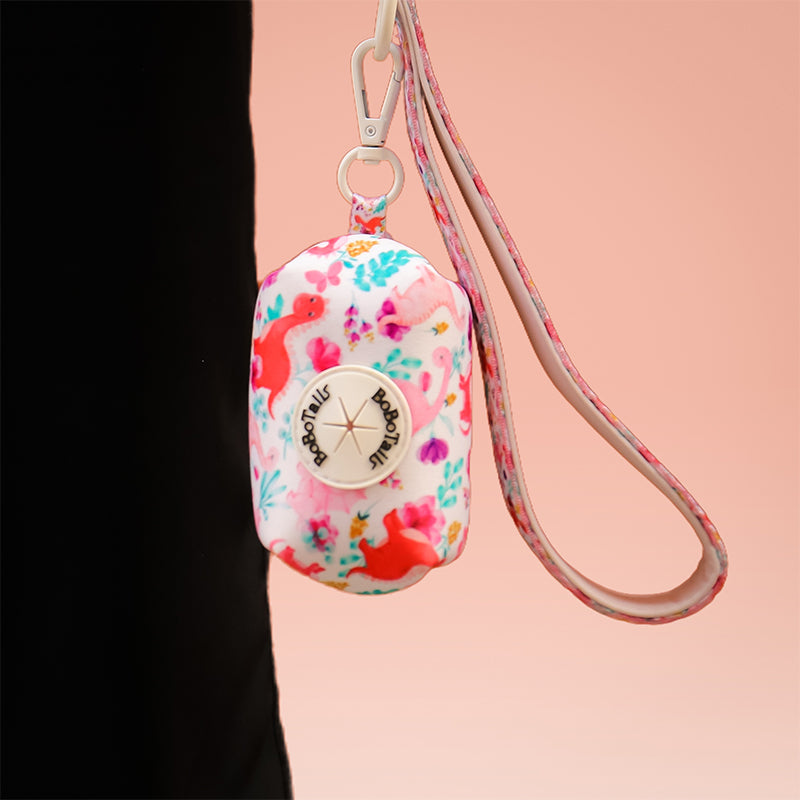 dinosaur printed dog leash with poop bag holder matching the harness and owner accessories for daily dog walks