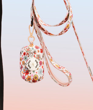 flower printed portable trash bag holder matching the harness and owner accessories for daily dog walks