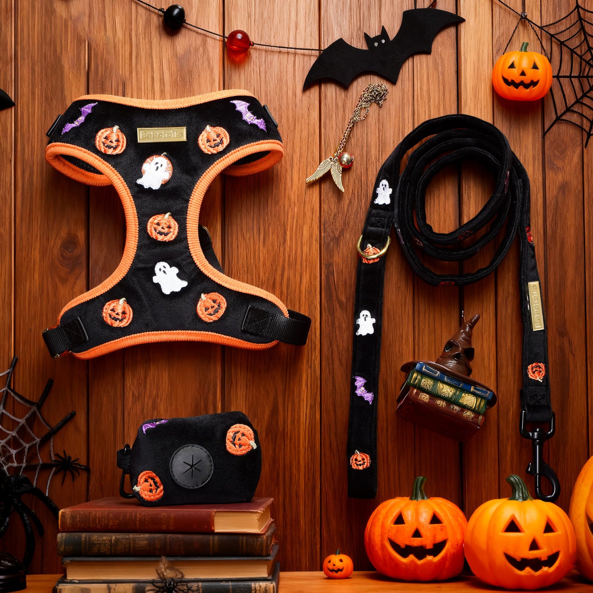 Halloween-themed dog harness and leash set on a wooden background with pumpkins and bats-BOBOTAILS