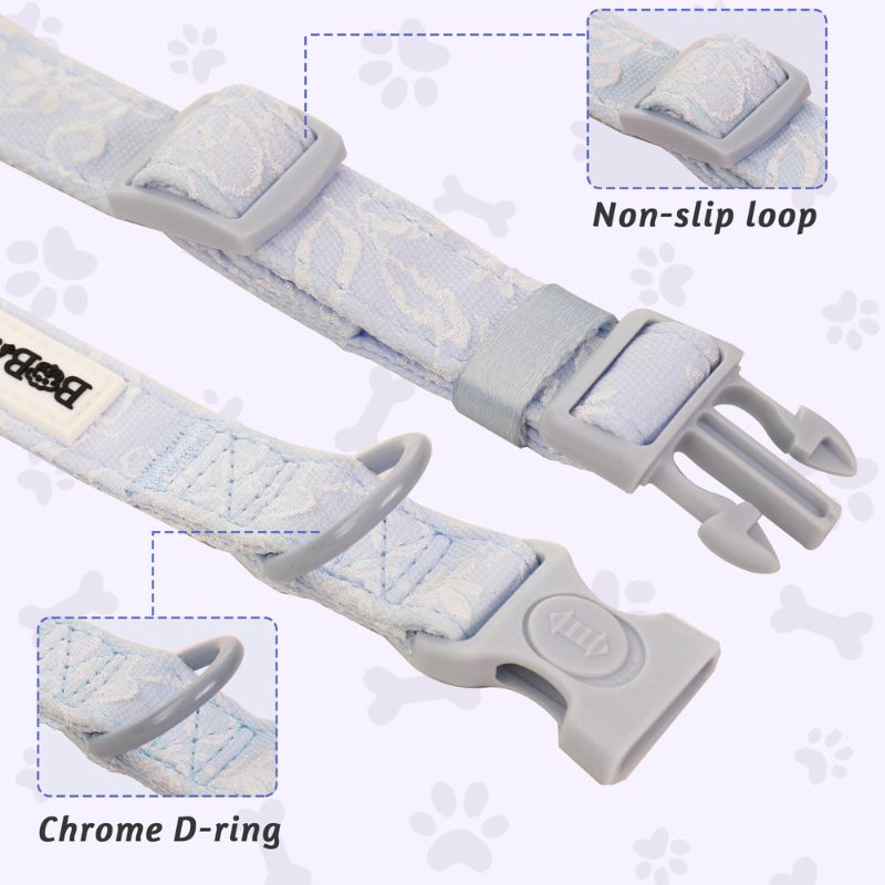 Dog collar with non-slip loop and chrome D-ring on a paw print background