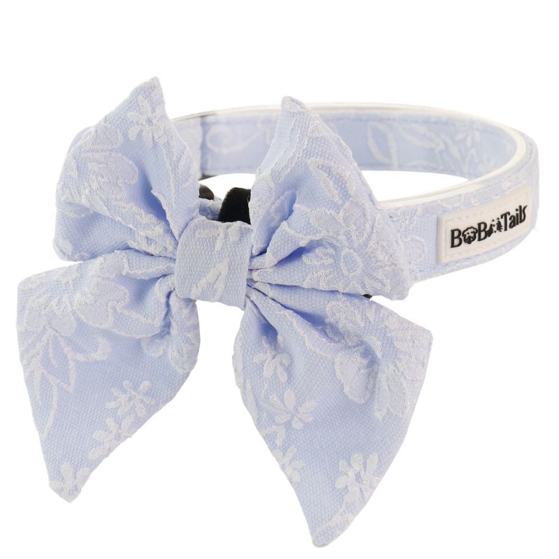 morning glory blue dog collar with bow tie designed to match the harness and owner accessories in a coordinated system