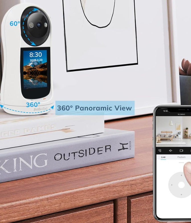 Smart camera with 360-degree panoramic view on a desk next to a smartphone displaying the app.